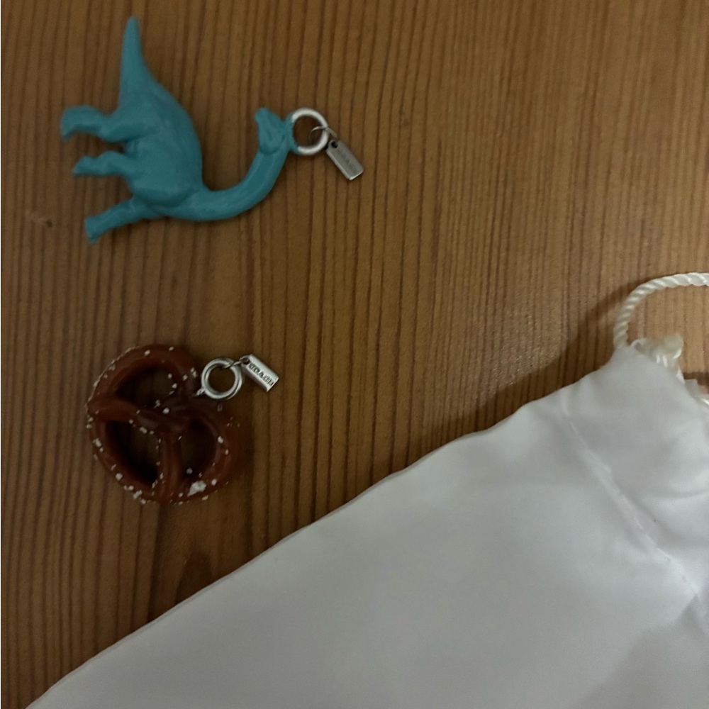 COACH shoe charms Blue Dinosaur and Brown Pretzel Charms with Drawstring Bag NEW - Picture 2 of 3